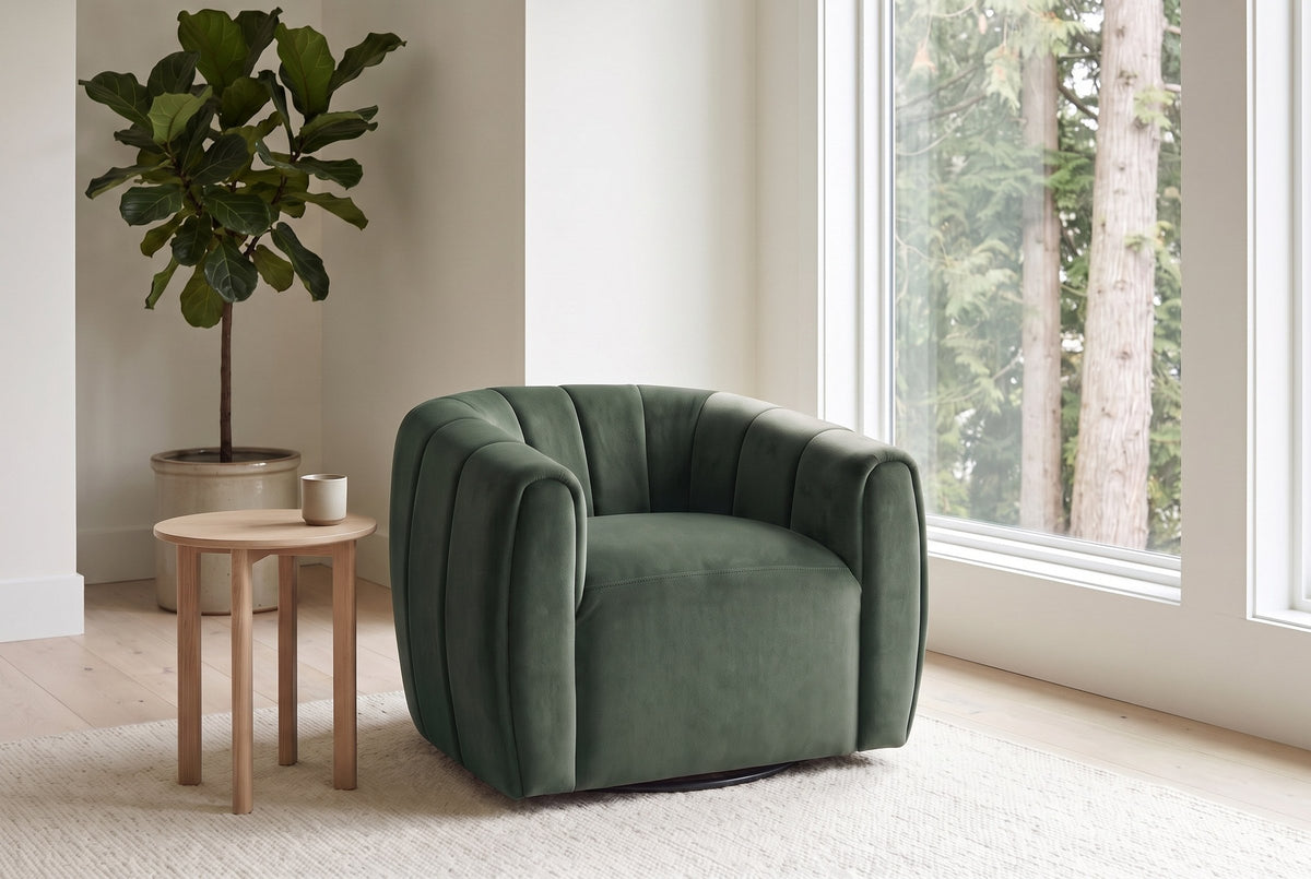 Cuneo swivel chair in olive green velvet beside a pale oak side table in a bright Vancouver living room