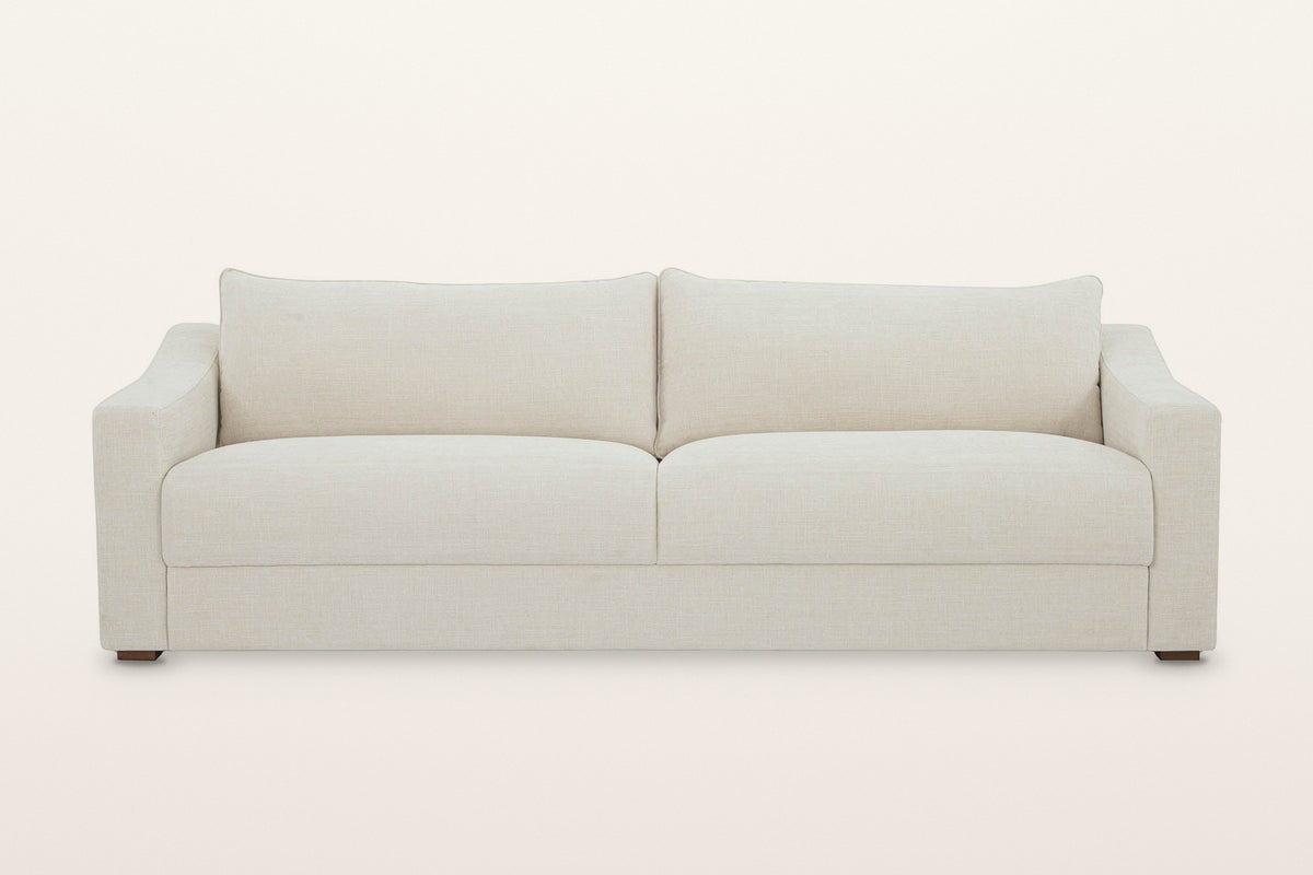 Cupramontana sofa in Beige, straight front view on a warm white studio backdrop: two box seat cushions