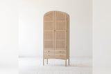 Dalton oak and rattan tall cabinet, angled view