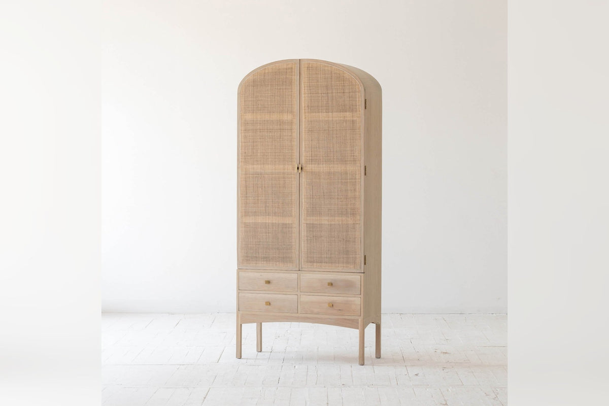 Dalton oak and rattan tall cabinet, angled view
