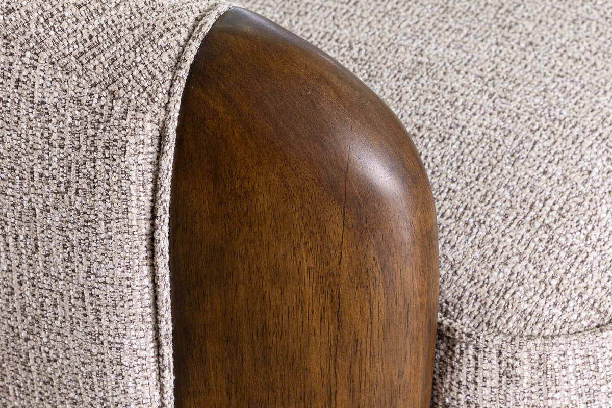 Close-up of the Ellery rubberwood arm panel against the flecked Wheat fabric
