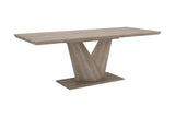 Ellis washed oak extension dining table with V-shaped pedestal base, three-quarter view