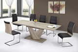 Ellis washed oak extension dining table with black and chrome chairs in a modern dining room