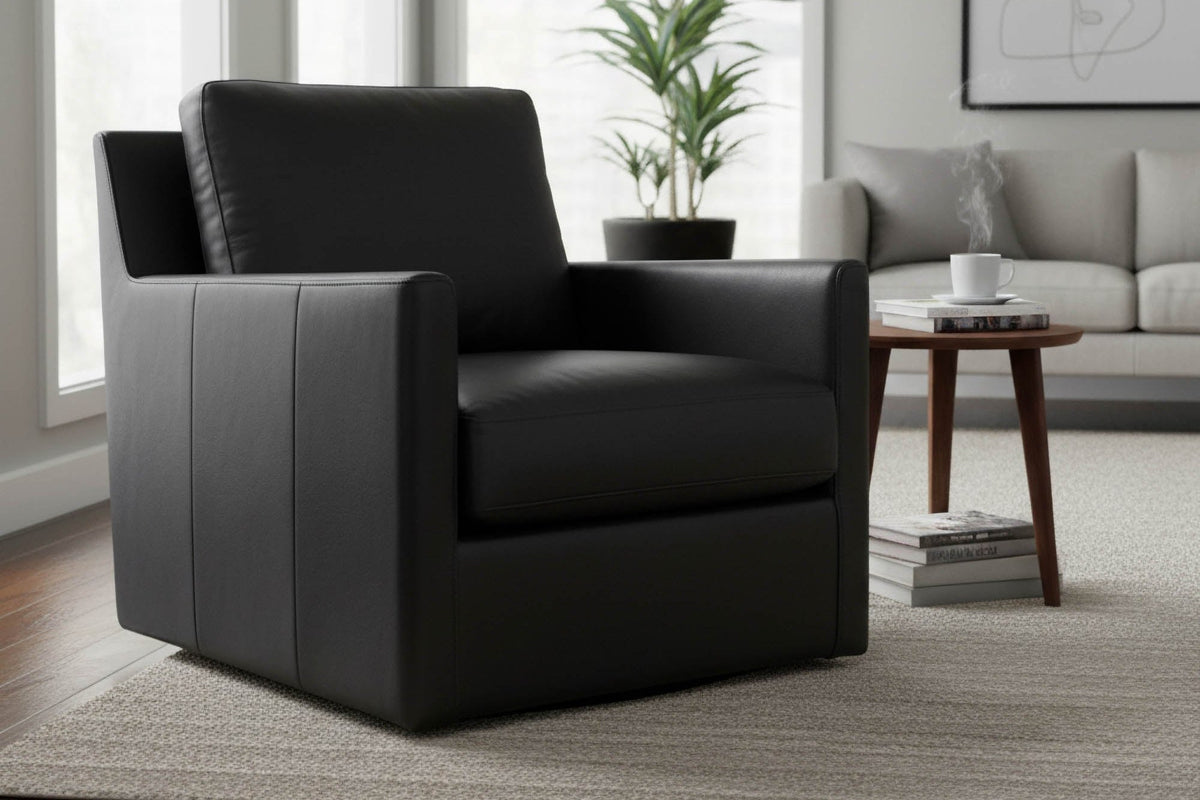Elwood Black leather swivel glider chair beside a wood side table in a bright living room