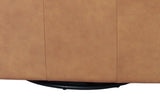 Swivel glider base beneath the Elwood chair in Latte leather