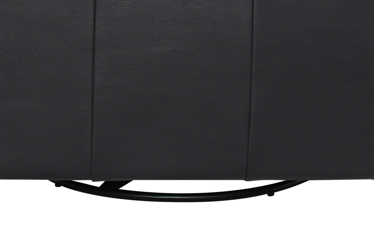 Swivel glider base beneath the Elwood chair in Black leather