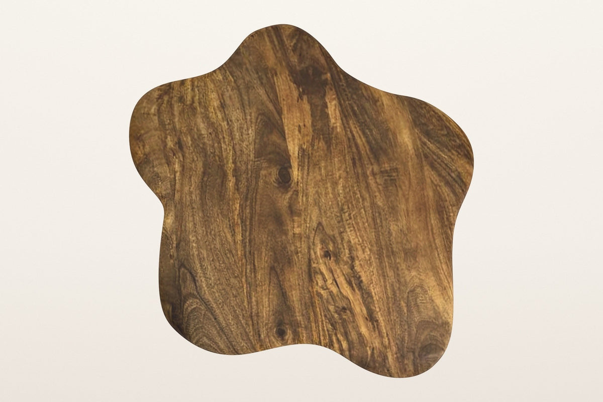 The large Exilles top in walnut-stained mango seen from above: irregular lobes and swirling grain