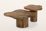 Exilles cloud-shaped coffee tables in walnut-stained mango wood, set of two on round drum bases, on a warm white studio backdrop