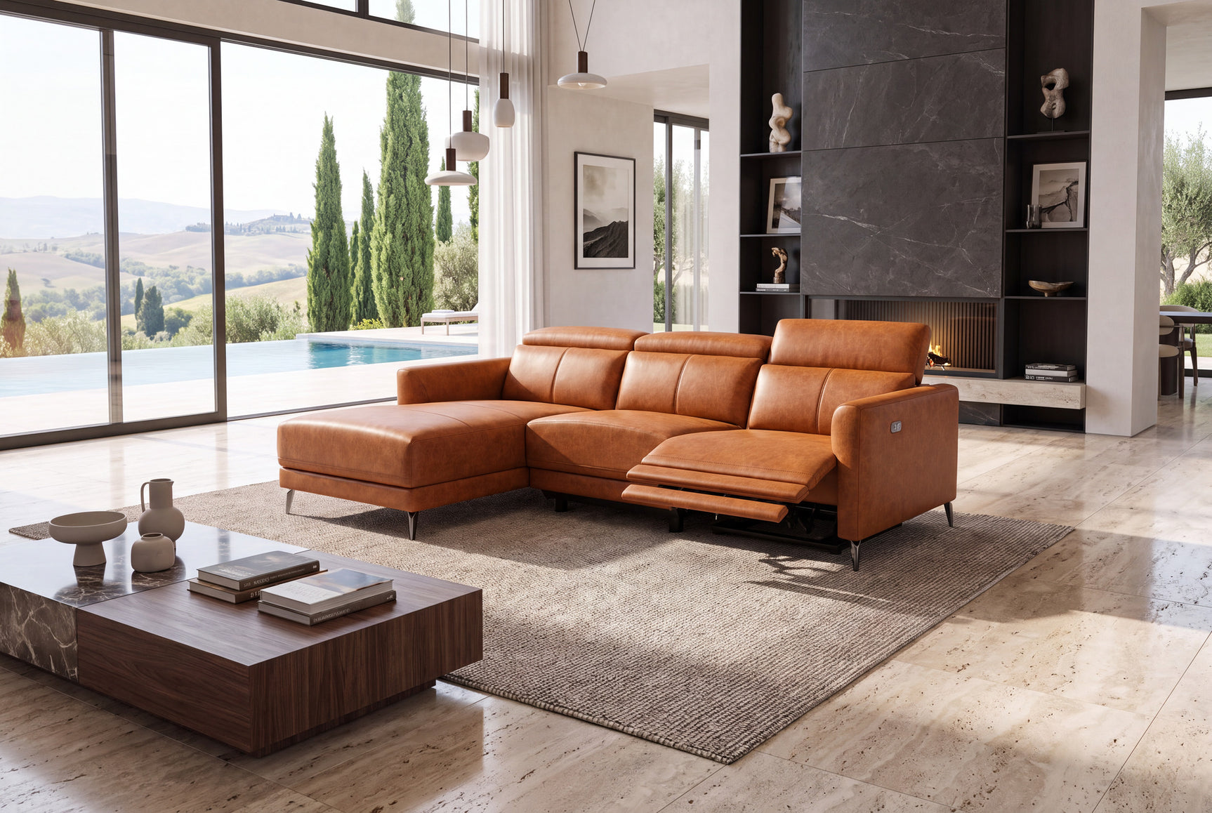 Andria cognac leather reclining sectional in a modern lounge with floor-to-ceiling pool views