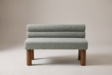 Fabriano bench in sage boucle, straight front view on a studio backdrop