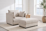 Faenza chair and ottoman in a white-panelled Halifax living room with windows onto the harbour