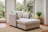 Faenza ottoman pushed against the chair to make a lounger, in a Victoria garden room with glass doors onto the garden