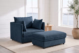 Faenza chair and ottoman in blue chenille in a white-panelled Halifax living room with windows onto the harbour