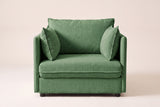 Faenza chair in green chenille, straight front view: slim flat arms, one back cushion and two throw pillows