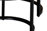 Close-up of the Farrow black powder-coated C-shaped metal base