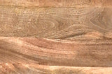 Close-up of natural mango wood grain on a Farrow tabletop