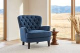 Feltre chair in a Calgary foothills den with a turned wood stool and a view of golden grassland