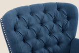 Close-up of the Feltre diamond-tufted back with covered buttons and silver nailheads