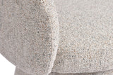 Close-up of the Finley chair's rounded arm and padded seat