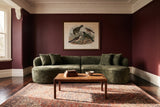 The Fiora sofa in Green in a Victorian parlour in Tasmania with burgundy walls