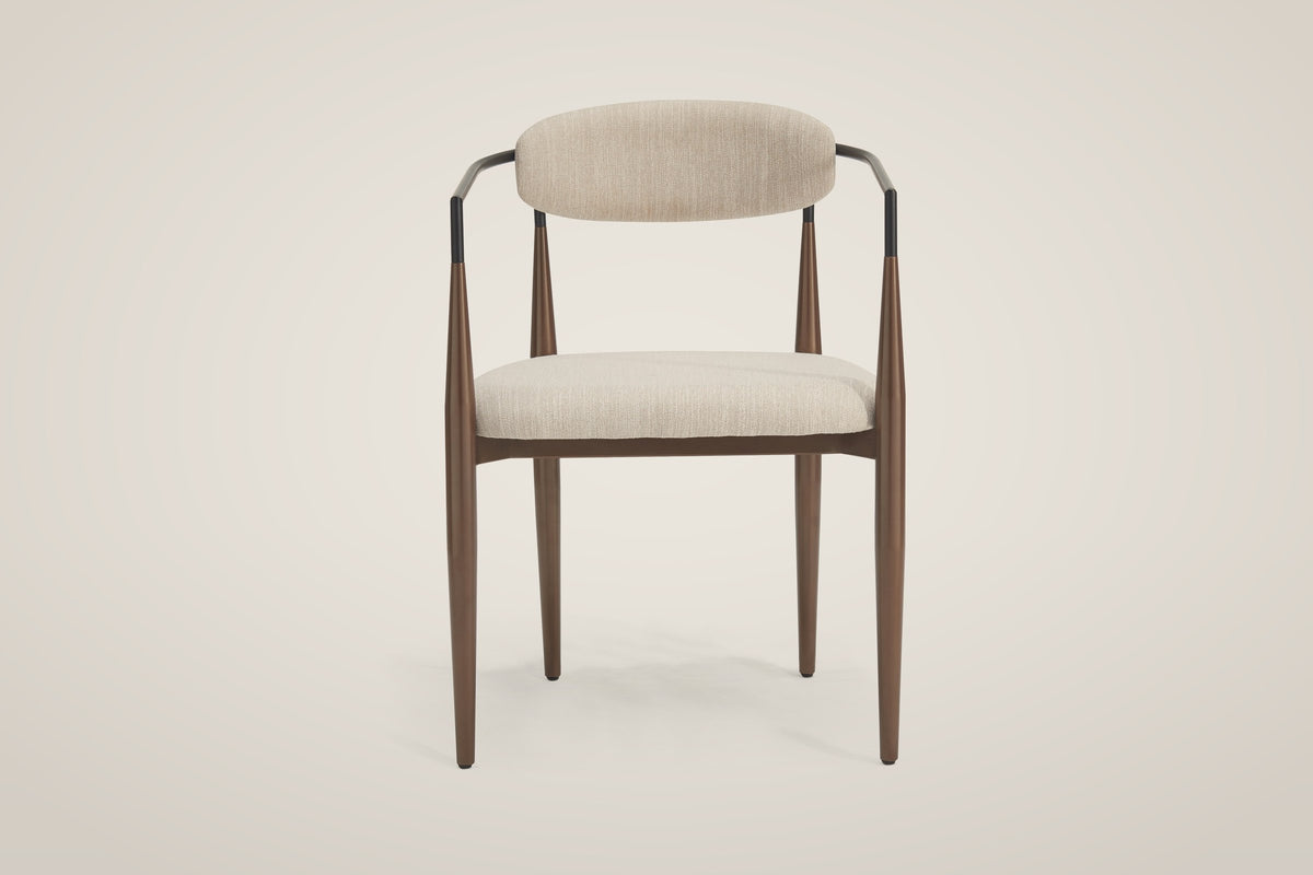 Fiuggi dining chair, straight front view: oval back pad, two black arm tubes, four tapered bronze legs