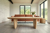 Frontino coffee table in Biscotti Oak seen low from the side before a terracotta linen sofa in a Frelighsburg orchard house