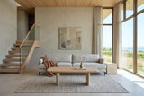 Frontino coffee table in Biscotti Oak facing the camera before a stone-grey linen sofa in a Picton house