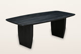 Frontino slab-leg oak dining table in Black, three-quarter view on a warm white studio backdrop