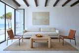 Furore coffee table in Biscotti Oak in a Sperlonga villa, with white lime plaster, juniper beams, a cream canvas sofa