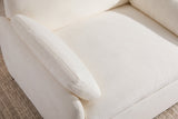 Close-up of the ivory chenille seat cushion, a throw pillow and the rounded arm