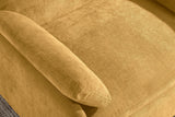 Close-up of the mustard yellow chenille seat cushion, a throw pillow and the rounded arm