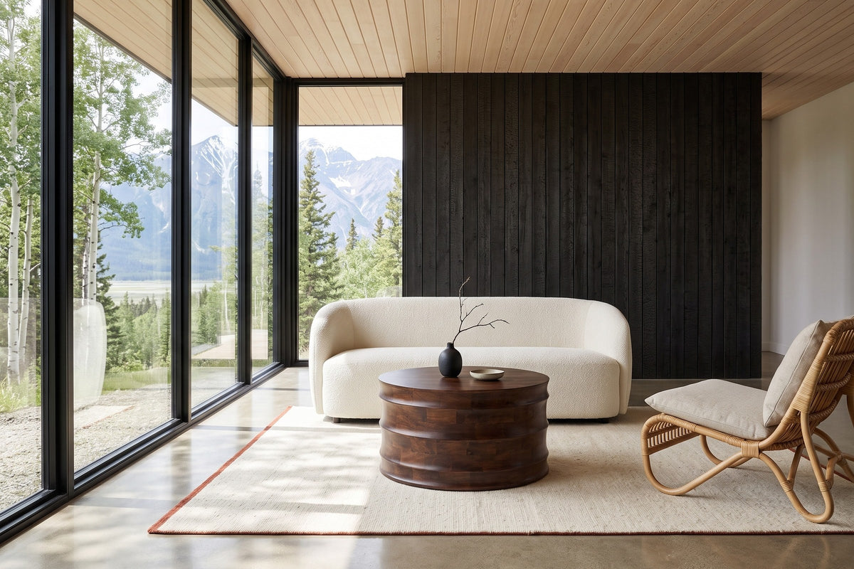 Gangi coffee table in Walnut before an ivory boucle loveseat in a Haines Junction house in the Yukon