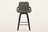 Gardone counter stool in charcoal, straight front view: the tall back, the winged seat, the black bentwood band and legs
