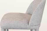 Close-up of the beige multi-tone textured fabric on the seat and the curved back of the Gavi counter stool