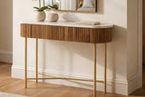 Gideon walnut console table with marble top in an entryway below a mirror