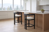 Two Gradisca counter stools in Black at a pale oak island in a bright Vancouver kitchen with mountain views