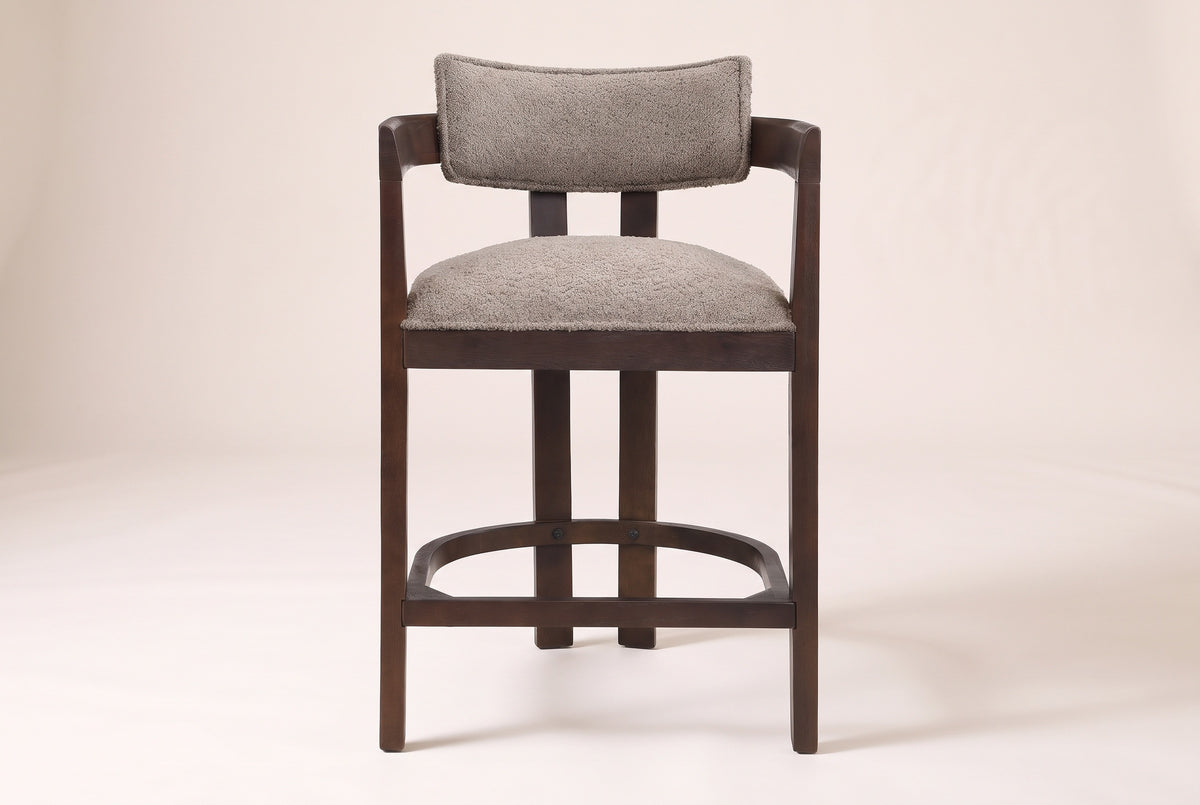 Gradisca horseshoe counter stool in Espresso with taupe boucle, straight front view on a studio backdrop