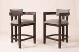 Gradisca counter stools, set of 2, in Espresso with taupe boucle, angled toward each other on a warm off-white backdrop
