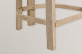 Close-up of the Gradisca front leg, rear legs and D-shaped footring with two small brass-tone bolts in Natural Ash