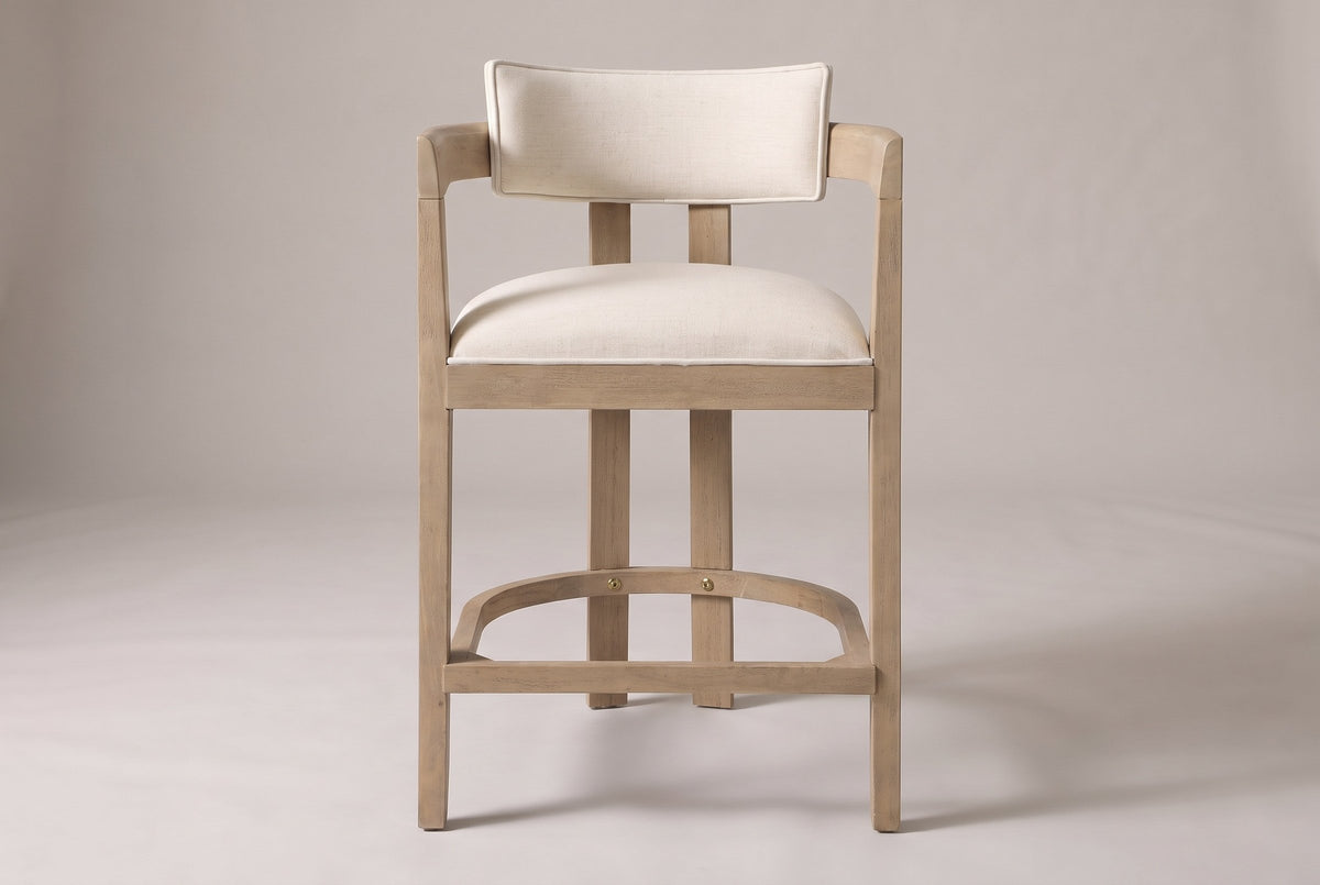 Gradisca horseshoe counter stool in Natural Ash, straight front view on a studio backdrop