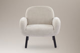 Grado accent chair in oat, straight front view: rounded back, two plump arms, four black legs