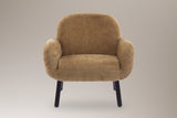 Grado accent chair in tan, straight front view: rounded back, two plump arms, four black legs