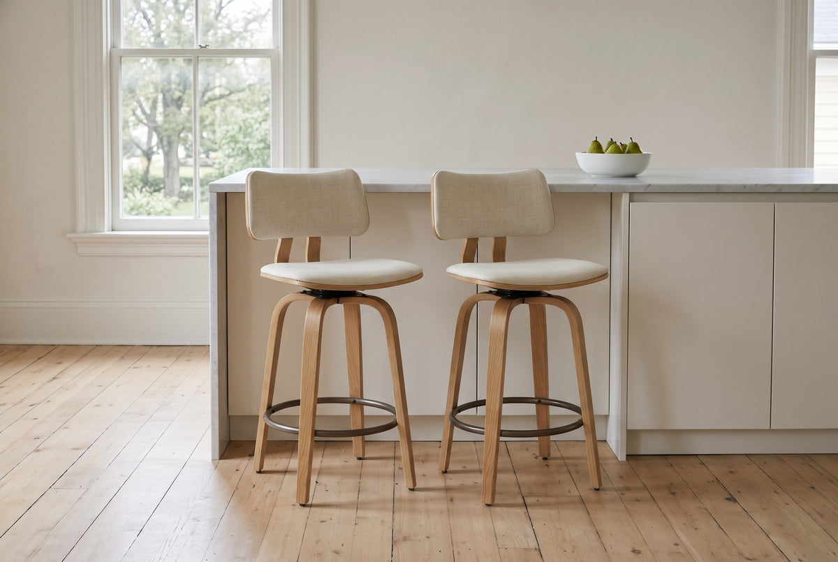 Two Gressoney counter stools in Beige / Natural at a warm white island with a marble top in a Victorian kitchen in Fredericton, elm trees through the sash window