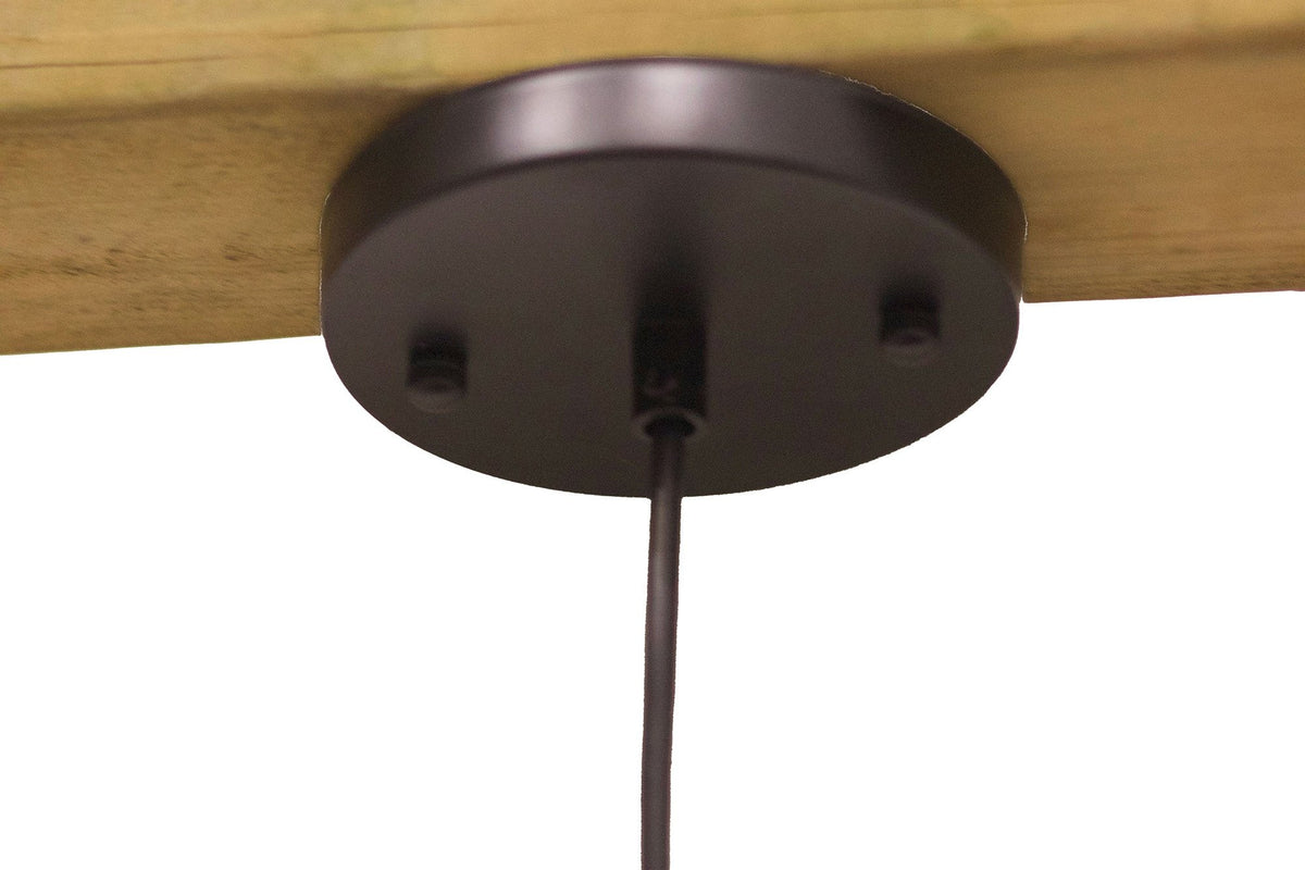 Close-up of the Halden pendant round black ceiling canopy and cord