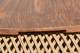 Halden teak top grain and the finger notch in the woven rattan rim
