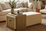Helena ottoman in a bright living room with the wood tray slid to one end