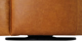 Black steel swivel base under the Hollis Saddle leather chair