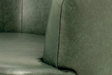 Close-up of the Forest Green top-grain leather arm and seat cushion