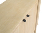 Black metal handles and acacia grain on the Ilaria sideboard top