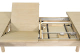 Folding leaf being raised from storage inside the Ilaria table